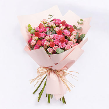 Blushing Pink Spray Roses With Chocolates
